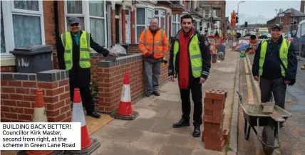  ?? CREDIT ?? BUILDING BACK BETTER! Councillor Kirk Master, second from right, at the scheme in Green Lane Road