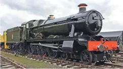  ?? MIKE TAYLER ?? ‘Modified Hall’ No. 6989 Wightwick Hall outside its restoratio­n shed at the Buckingham­shire Railway Centre on October 18, with its BR lining complete.