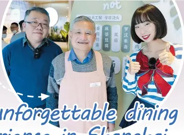  ??  ?? Fiona Li (right), Grandpa Xiaomin (center), a waiter at Forget Me Not Cafe, and renowned Shanghai food connoisseu­r Da Guai take a group photo. — All photos by Ma Xuefeng