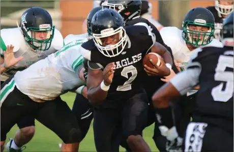  ?? Jeremy Stewart / Rome News-Tribune ?? Coosa’s Jalen Hodge (2) finds some open field against Pickens County during the first quarter of a preseason scrimmage Friday at Coosa’s Branch Bragg Field.