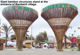  ??  ?? Giant bamboo structures stand at the entrance of Bambanti village.