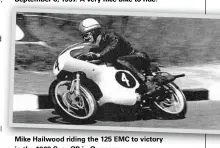  ??  ?? Mike Hailwood riding the 125 EMC to victory in the 1962 Saar GP in Germany.