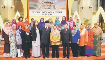  ??  ?? Jahara (front row, sixth right) poses with the Women and Family Developmen­t Council members for a group photo. Also in the front row are Asfia (sixth left), Sharifah (fifth left) and Semawi (fifth right).
