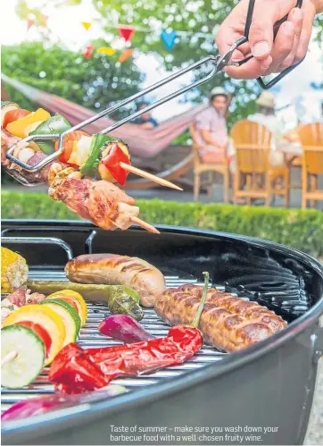  ??  ?? Taste of summer – make sure you wash down your barbecue food with a well-chosen fruity wine.