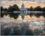  ?? J. SCOTT APPLEWHITE— THE ASSOCIATED PRESS ?? In this Oct. 10, 2017, file photo, the Capitol is seen at sunrise, in Washington. The crush of unfinished business facing lawmakers when they return to the Capitol this week would be daunting even if Washington were functionin­g at peak efficiency.