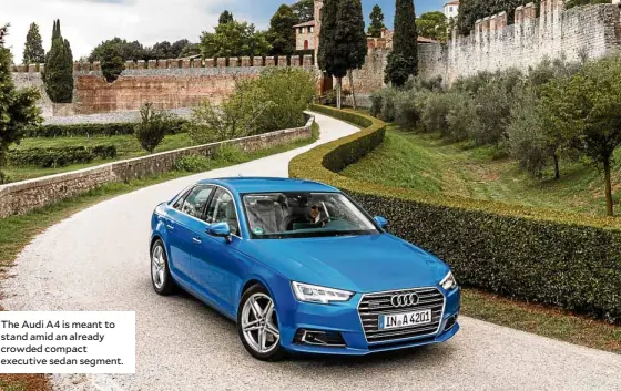  ??  ?? The Audi A4 is meant to stand amid an already crowded compact executive sedan segment.