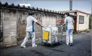  ?? NYT ?? Health care workers in Houki, Japan, collect used adult diapers to be recycled into pellets. Waste from adult diapers is growing by tens of thousands of tons a year.
