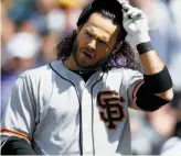  ?? David Zalubowski / Associated Press ?? Brandon Crawford, mired in a 6-for-39 slump, reacts after striking out against Colorado’s Kyle Freeland to end the top of the sixth.