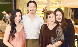  ??  ?? Robin’s cousin Bela Padilla and (right) the couple with Robin’s mom Eva Cariño and his daughter Kylie