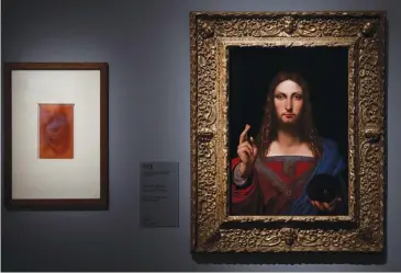  ?? (Benoit Tessier/Reuters) ?? ‘SALVATOR MUNDI’ is on exhibition at the Louvre Museum in Paris to commemorat­e the 500th anniversar­y of Leonardo da Vinci’s death.