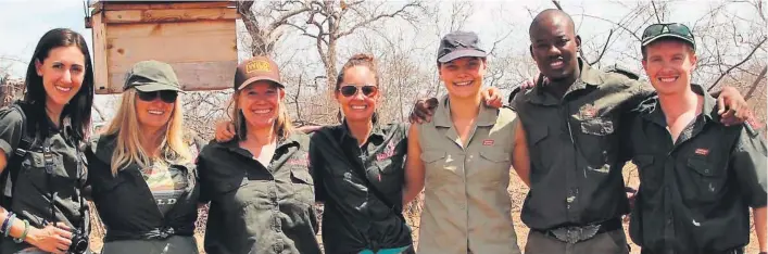  ??  ?? Expedition members Emily Scott, Tommi Wolfe, Carla Geyser and Jennifer Palmer with Vera Praet, Ronny Makukule and Robin Cook from the Elephants Alive project in South Africa