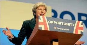  ?? AP ?? British Prime Minister and Conservati­ve Party Leader Theresa May addresses delegates during a speech at the Conservati­ve Party Conference at the ICC, in Birmingham.