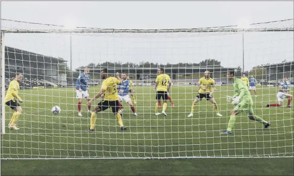  ?? Pictures: Daniel Chesterton/phcimages.com ?? HITTING THE FRONT Jack Whatmough, second-left, gives Pompey a 3-2 lead en route to their victory at Burton Albion on Saturday.