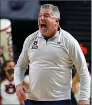  ?? (AP/Brynn Anderson) ?? Auburn Coach Bruce Pearl reacts during the second round of a NCAA Tournament game against Miami in Greenville, S.C., in March. The Tigers are just one of many basketball programs taking advantage of the NCAA transfer portal and adjusting to the sport’s shifting landscape.