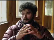  ?? ASSOCIATED PRESS FILE PHOTO ?? Pakistani mountain climber Shehroz Kashif, 19, gives an interview to The Associated Press in Skardu, a town in the Gilgit Baltistan region of northern Pakistan, in 2021.