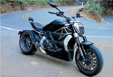  ??  ?? Muscular looks with superbike-mimicking performanc­e: XDiavel most powerful cruiser motorcycle on the market.