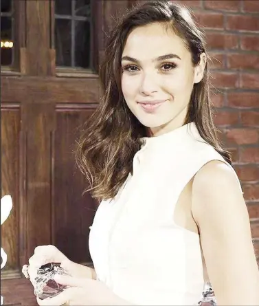  ??  ?? Photograph of Gal Gadot taken by Andrew H. Walker/Getty Images for Gucci Fragrance