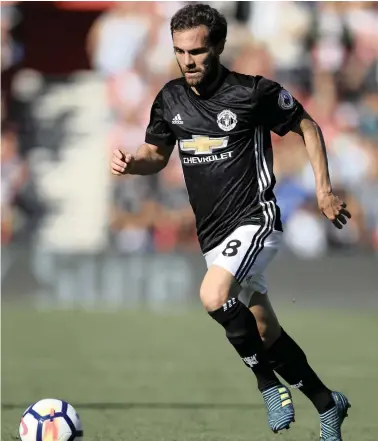  ??  ?? WINGING IT: Manchester United’s Juan Mata enjoys creating havoc by cutting in from the right.