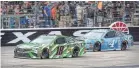  ?? JEROME MIRON/USA TODAY SPORTS ?? Kyle Busch (No. 18 Toyota) and Kevin Harvick (No. 4 Ford) have dominated the Monster Energy NASCAR Cup Series this year.