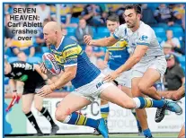  ??  ?? SEVEN HEAVEN: Carl Ablett crashes over