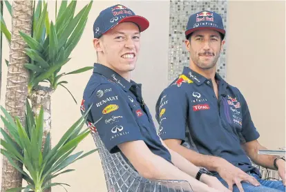  ??  ?? Red Bull drivers Daniel Ricciardo, right, and Daniil Kvyat in Abu Dhabi yesterday.