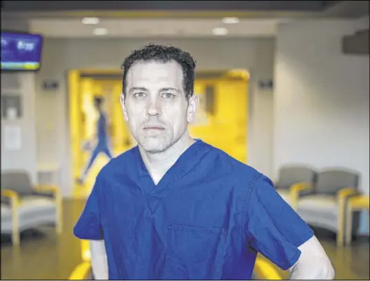  ?? Benjamin Hager Las Vegas Review-Journal @benjaminhp­hoto ?? Dr. Christophe­r Voscopoulo­s says he is upbeat about the progress hospitals made in treating COVID-19 patients.