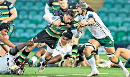  ??  ?? Man of the match: Alex Mitchell dives over the line for the second of his two tries in a stand-out performanc­e against London Irish