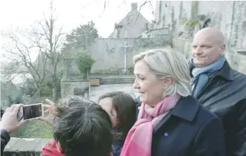  ?? — Reuters ?? Marine Le Pen, French National Front (FN) political party leader and candidate for French 2017 presidenti­al election, visits Le Mont-Saint-Michel on Monday.