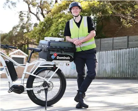  ?? Photo: Contribute­d ?? PUSHING AHEAD: Levi Johns, a pizza delivery rider for Domino’s Pizza in Cronulla, enjoys the flexibilit­y of his job.