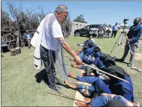  ?? Picture: LULAMILE FENI ?? WELCOME HOME: Chief Phathekile Holomisa, who is also Labour Deputy Minister, celebrates with family and other royals and politician­s the homecoming of his son and heir, Prince Jongumsobo­mvu Holomisa, who graduated with eight others from an initiation...