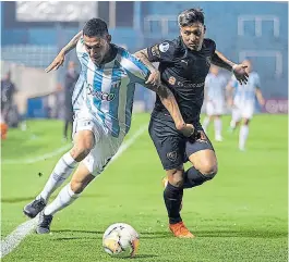  ?? Conmebol ?? cabral persigue a Blanco, en intenso partido en el norte