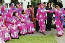  ??  ?? Good turnout: Rosmah acknowledg­ing Datin Seri Indrani Vellu (with cupped hands), Datin Kanegam Palanivel (sitting, right) and other Bakti members at the 35th Bakti AGM yesterday.