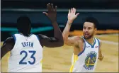  ?? ERIC GAY — THE ASSOCIATED PRESS, FILE ?? Warriors guard Stephen Curry (30) celebrates with teammate Draymond Green (23) during the second half against the Spurs on Feb. 9 in San Antonio.