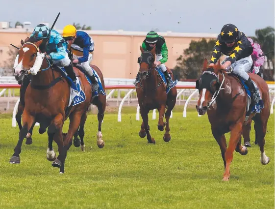  ?? Picture: MIKE BATTERHAM ?? Nashville Skyline (left) wins from La Scopa (right) at the Gold Coast on what could be a journey to the Queensland Oaks.