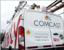  ?? THE ASSOCIATED PRESS ?? Comcast Corp. says it added more than 400,000 internet customers in the fourth quarter.