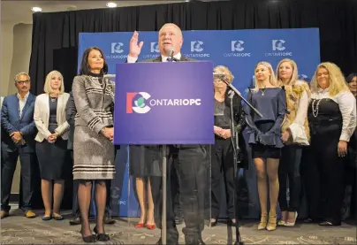  ?? CP PHOTO ?? Doug Ford recalls the name of his brother Rob Ford as he stands at the podium after being named as the newly elected leader of the Ontario Progressiv­e Conservati­ves at the delayed Ontario PC Leadership announceme­nt in Markham, Ont., on Saturday.