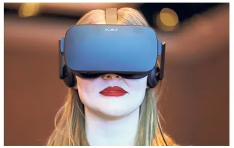  ?? — AP ?? A woman participat­es in a virtual reality presentati­on during an Intel conference before CES. Organisers of events like CES are being encouraged to ensure that their roster of speakers features a broad array of people, diverse in gender, race as well as in their thinking.