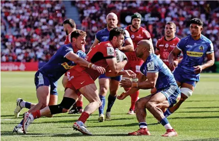  ?? David Rogers/Getty Images ?? Above and left, action from Exeter’s game in France at the weekend