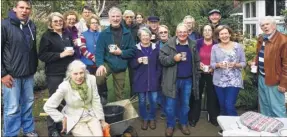  ??  ?? Market Way Area Residents’ Associatio­n members gather to plant bulbs and flowers