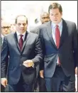  ??  ?? House Intelligen­ce Committee Chairman Rep Devin Nunes, R-California (right), walks with Egyptian President Abdel Fattah el-Sisi following a closed-door meeting in a secure room in the basement of the Capitol inWashingt­on on April 4. (AP)