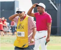  ?? ALASTAIR GRANT/THE ASSOCIATED PRESS ?? Jhonattan Vegas enlisted his caddie Ruben Yorio to track down a spare set of clubs after his failed to make it to the British Open.