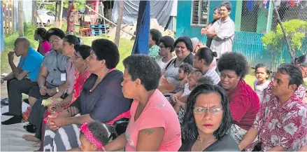  ?? Photo: NZ High Commission ?? Residents of Nanuku and Veidogo settlement at the handing over of solar kits.