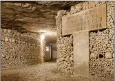  ?? ?? The Paris catacombs, lined with bones.