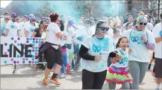  ?? Herald photo Tim Kalinowski ?? Volunteer Lethbridge’s annual Colour Fun Run was a big success again this year with about 300 runners taking part. The Colour Fun Run also served as the unofficial kickoff to National Volunteers Week in the city.