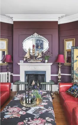  ??  ?? Living Room
‘Wherever I’ve lived, I’ve painted one room in this deep aubergine colour. I find it very soothing,’ says Alice. Get the look
Find a similar mirror at B&T Antiques. The sofas are bespoke.