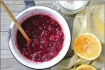  ?? JIM WILSON, NYT ?? A cranberry sauce, sweetened with sugar and seasoned with orange juice, is the most traditiona­l approach.