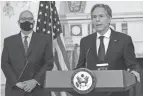  ?? ANDREW CABALLERO-REYNOLDS/POOL VIA AP ?? Secretary of State Antony Blinken speaks while announcing that Jonathan Moore, back, is the new coordinato­r for its investigat­ion into cases of Havana Syndrome.