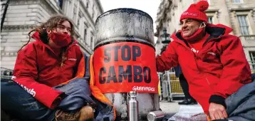  ?? ?? Protest: Greenpeace activists against the Cambo field outside Downing Street