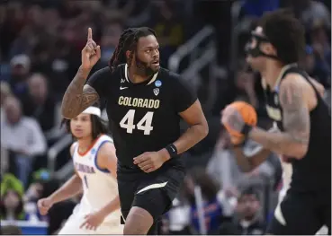  ?? MICHAEL CONROY — THE ASSOCIATED PRESS ?? Colorado center Eddie Lampkin Jr. reacts after making a basket against Florida on March 22in Indianapol­is.