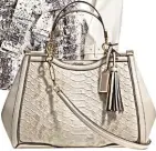  ??  ?? Embossed Madison bag, RM4,700, Coach